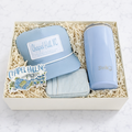 UNC graduation gift box with Swig tumbler, Chapel Hill hat and zip wallet in Tar Heel blue