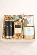 The Evergreen luxury gift box with customized YETI 20oz tumbler, hot chocolate and artisan popcorn